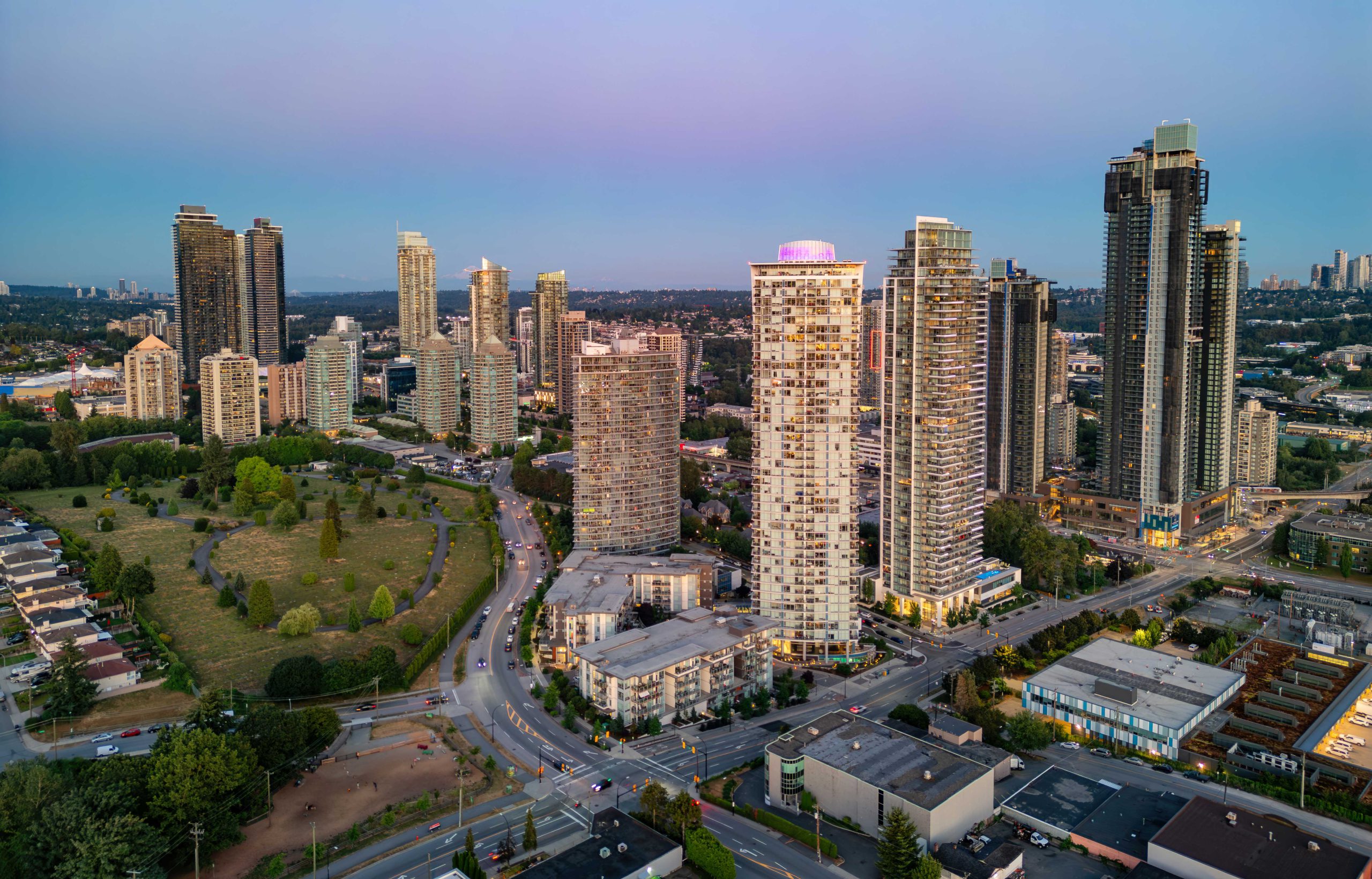 Burnaby, BC skyline at dusk — home of the Dr. Owlia Aesthetics clinic on East Hastings Street